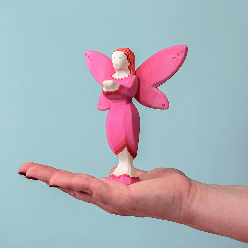 Thumbnail: Bumbu Toys Blossom Fairy in hand. Handcrafted Waldorf inspired small world toys. Imaginative play and storytelling