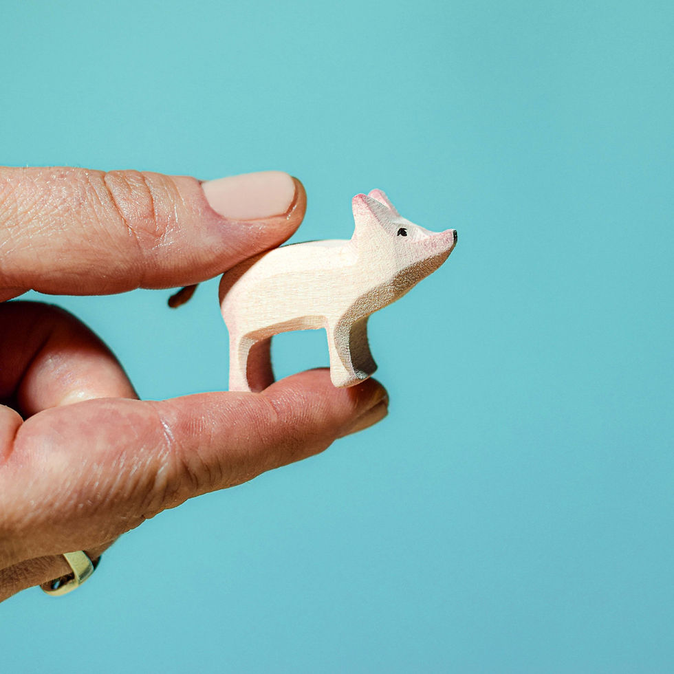Thumbnail: Bumbu Toys Wooden Piglet Standing in hand. Handcrafted Waldorf inspired small world toys. Imaginative play and storytelling