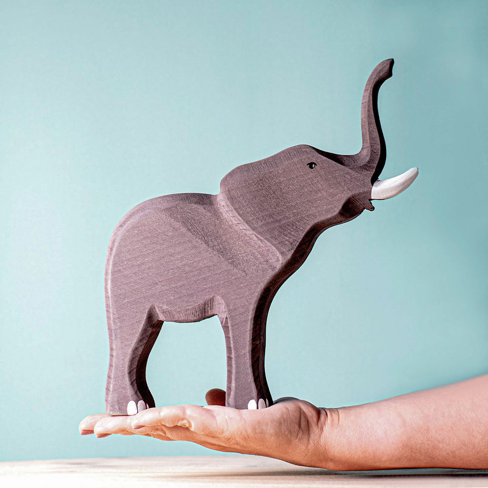 Thumbnail: Bumbu Toys Large Wooden Elephant in hand. Handcrafted Waldorf inspired small world toys. Imaginative play and storytelling