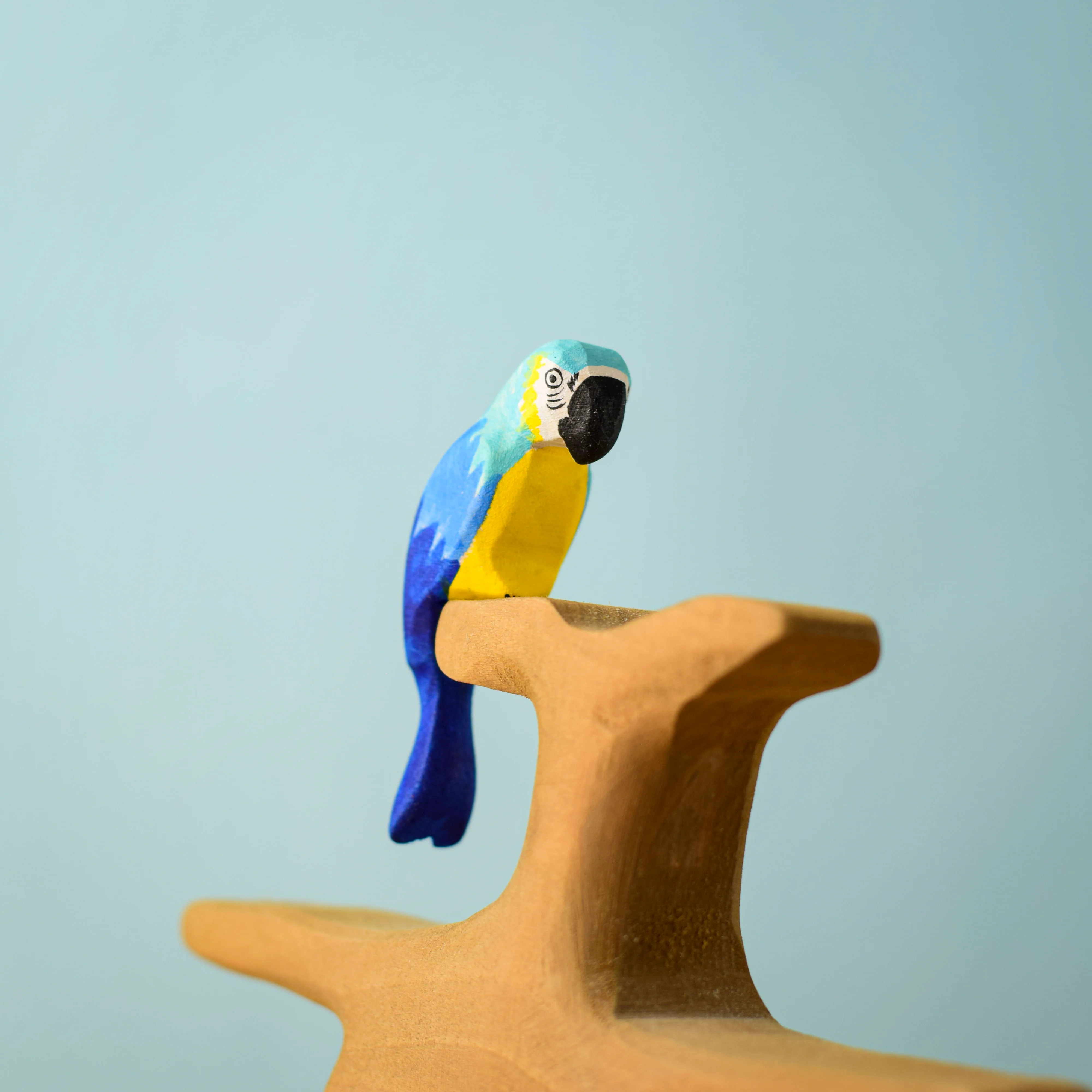 Curated visual reference: Bumbu Toys Wooden Blue Macaw Parrot Photo Inspiration