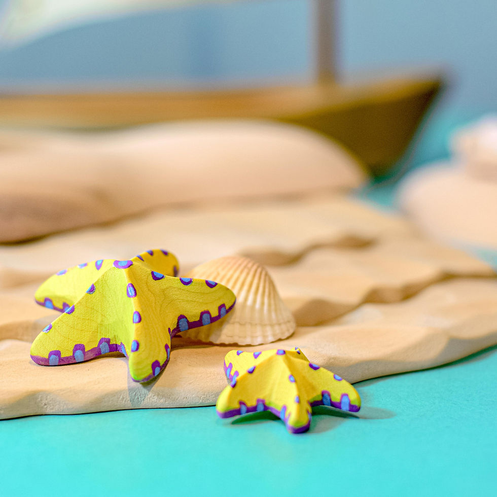 Thumbnail: Bumbu Toys Wooden Yellow Starfish Set. Handcrafted Waldorf inspired small world toys. Imaginative play and storytelling