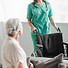 attractive-young-female-nurse-bringing-wheelchair-senior-patient.jpg