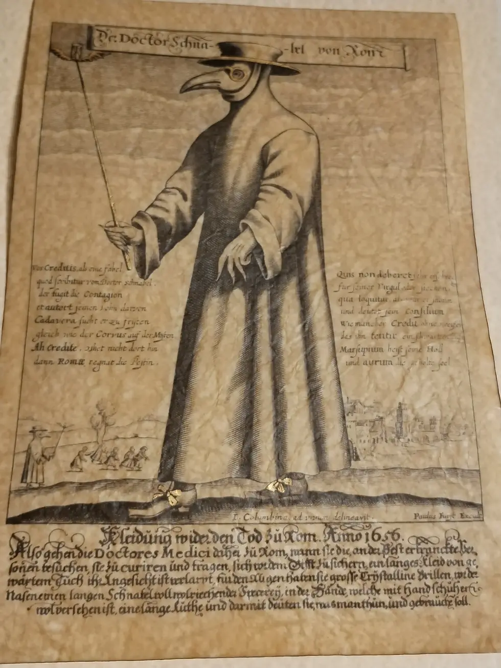 Thumbnail: Full 1656 plague doctor print on aged beeswax paper with gold paint on shoe bows and authentic burned edges.