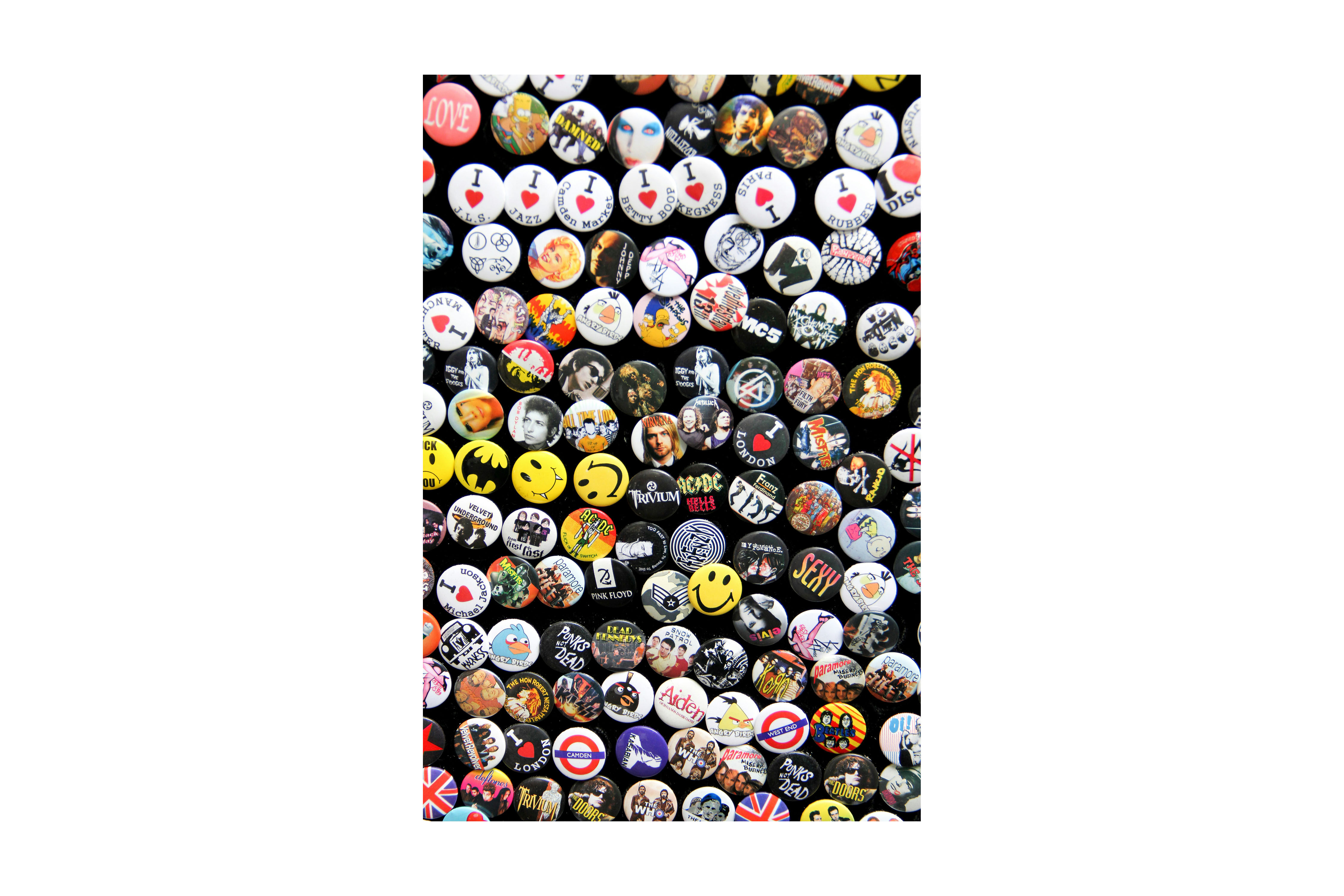 Promotional tin button badges, great for creating memorable branded giveaways and adding flair to events.