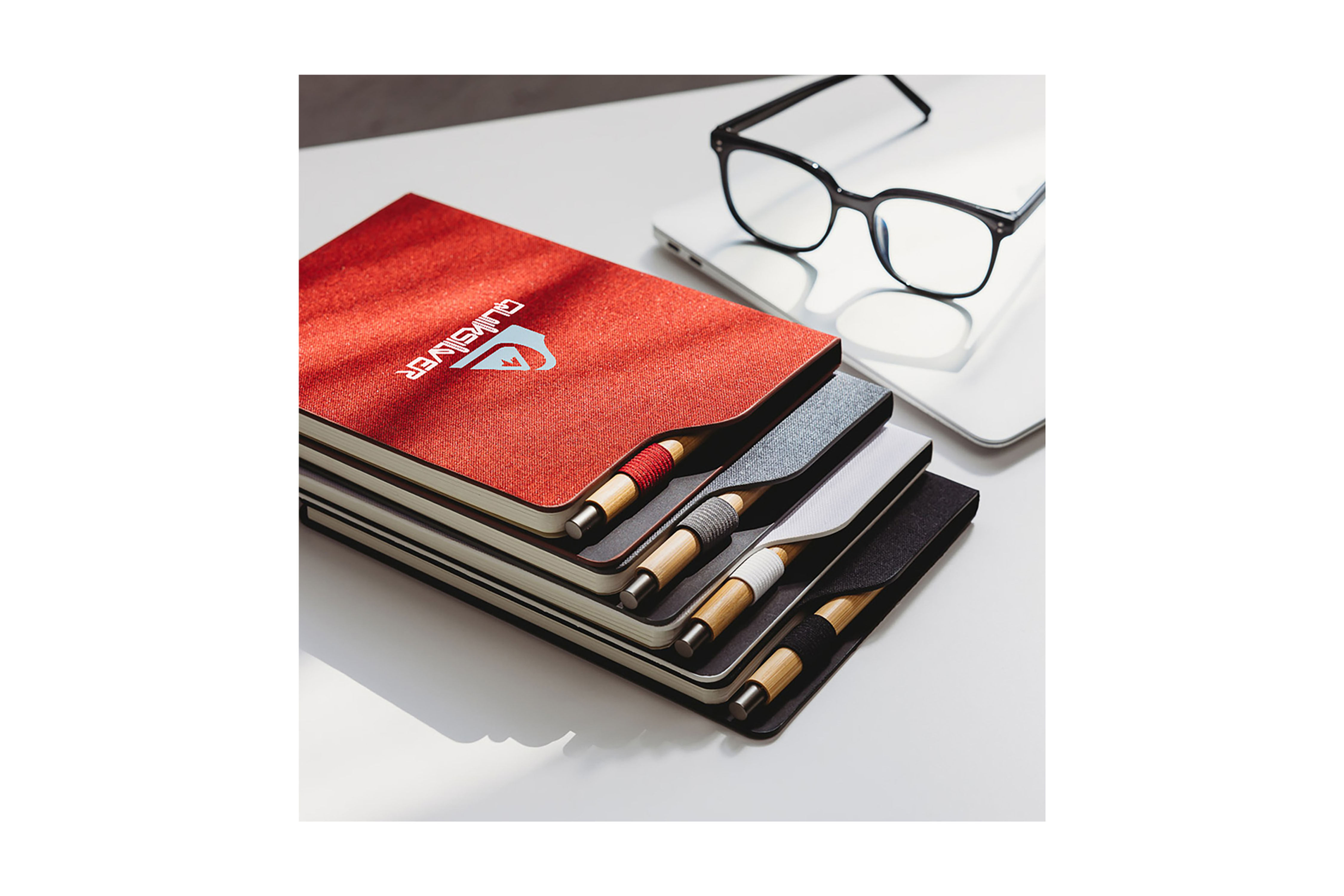 Sustainable A5 recycled paper rPET notebooks with bamboo pen customised with your logo for eco-friendly corporate branding