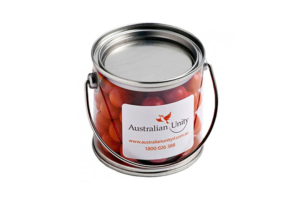Small bucket filled with orange choc drops (Jaffa style), ideal for promotional confectionery and branded giveaways