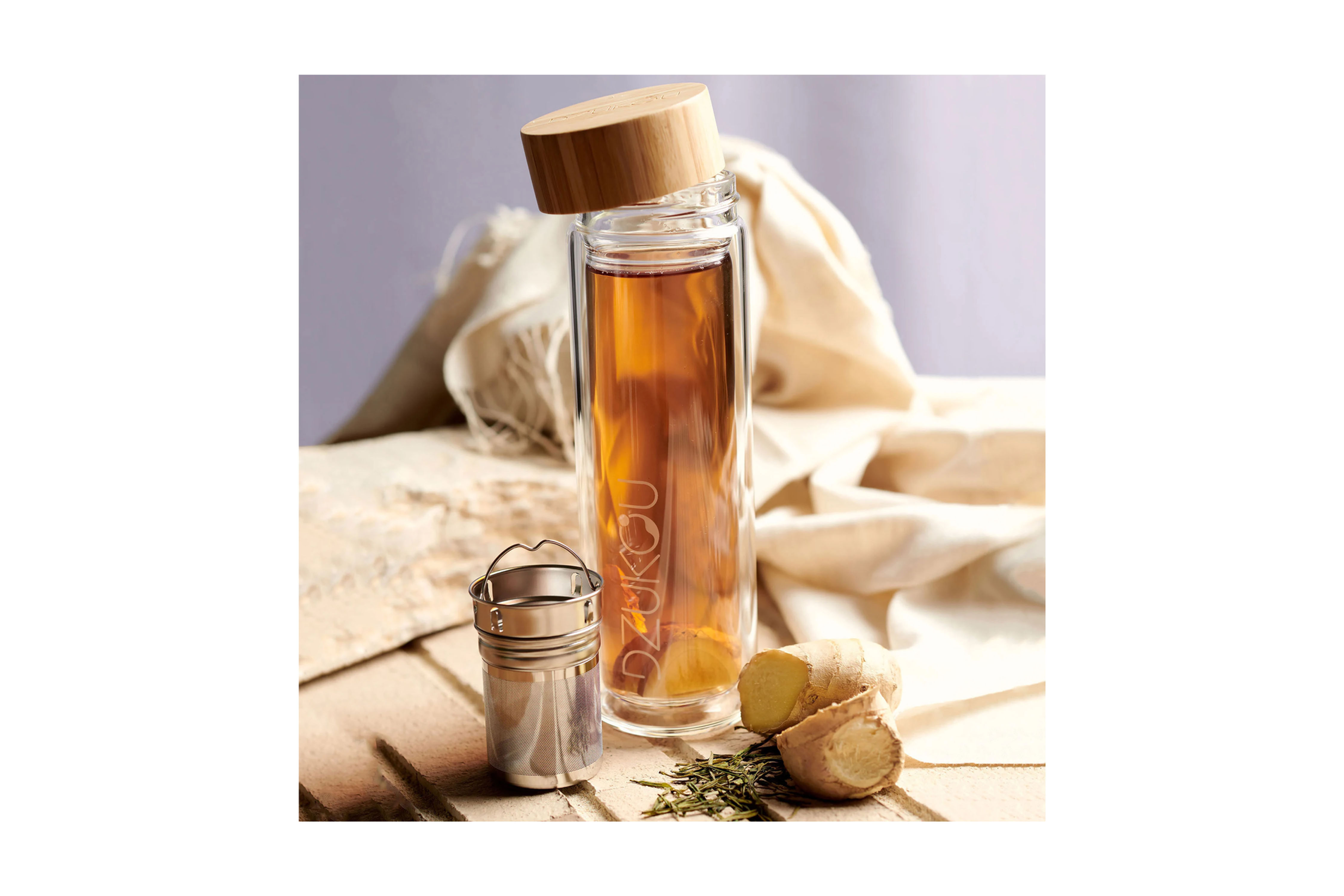Brew tea on the go with a custom branded 410ml glass infuser bottle designed for stylish everyday hydration