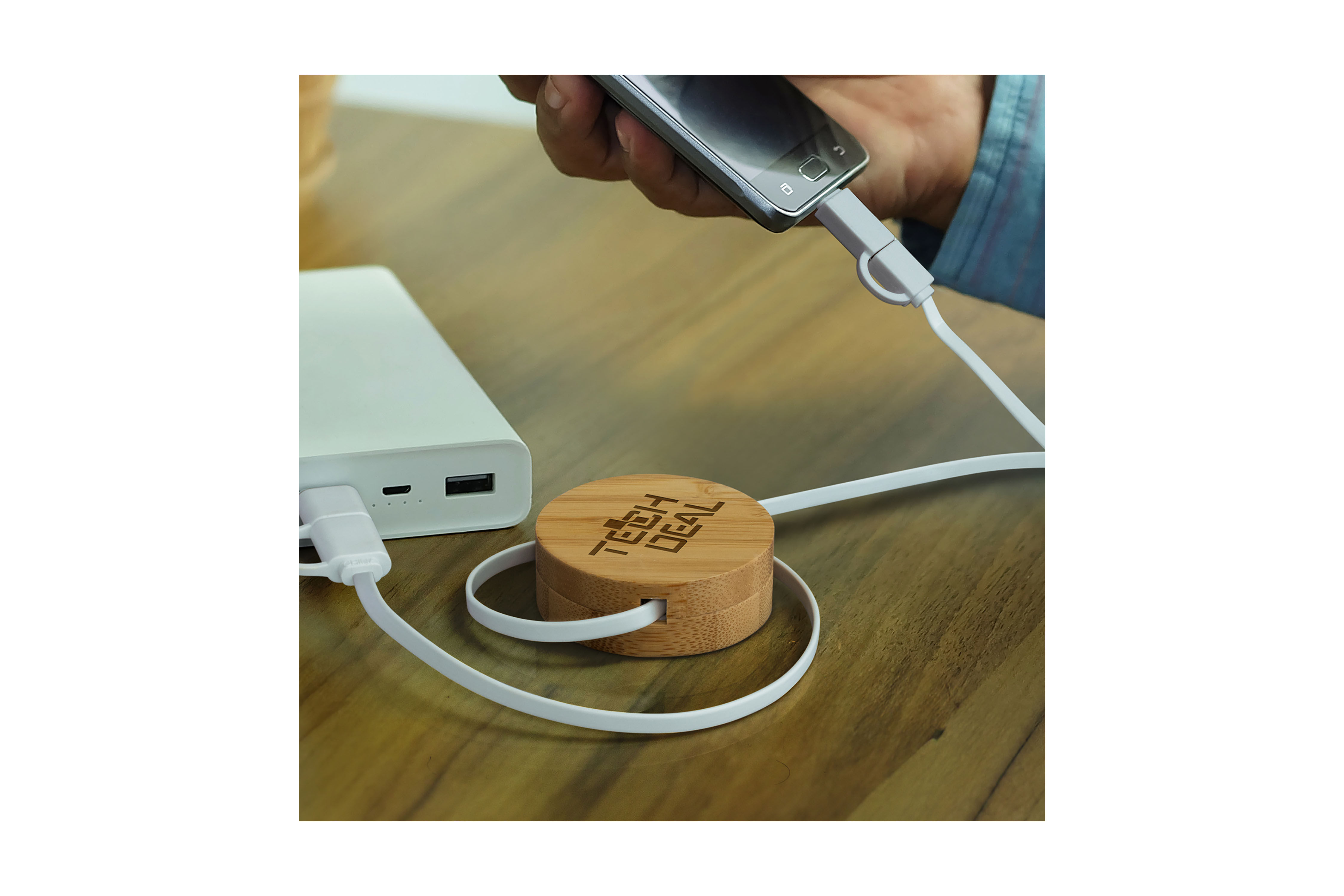 Custom bamboo retractable charging cable with eco-friendly design, perfect for sustainable tech promotions.