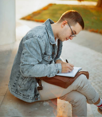 man journaling