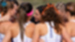Coach Maurica Powell (center) & the Washington women preparing for the Nuttycombe Invite // Photo via Griffin Forberg