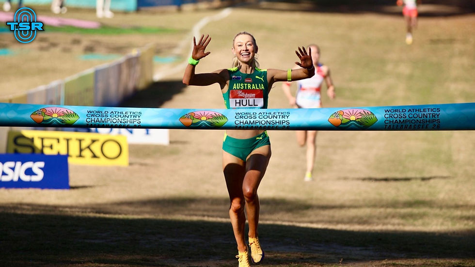 Jessica Hull crosses the finish line to give Australia's mixed relay team gold at the World XC Championships // Photo via Jan Figueroa