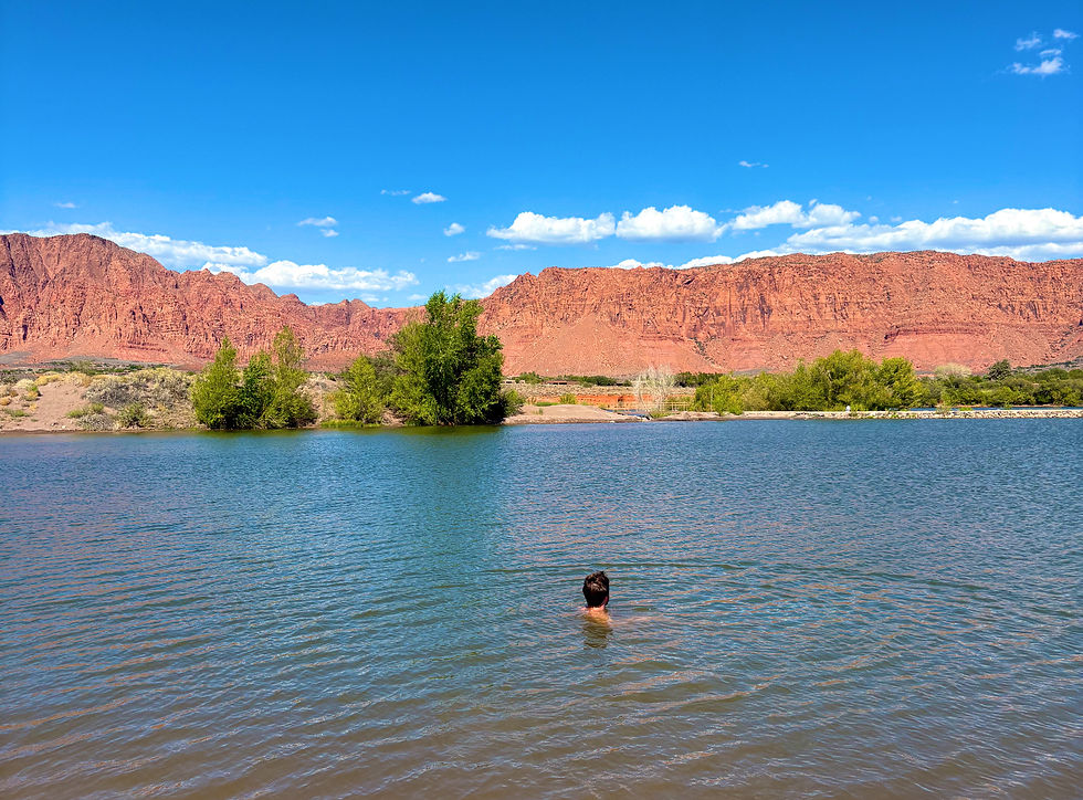 Man in fire lake park in Mountains and rocks in St.George, Utah