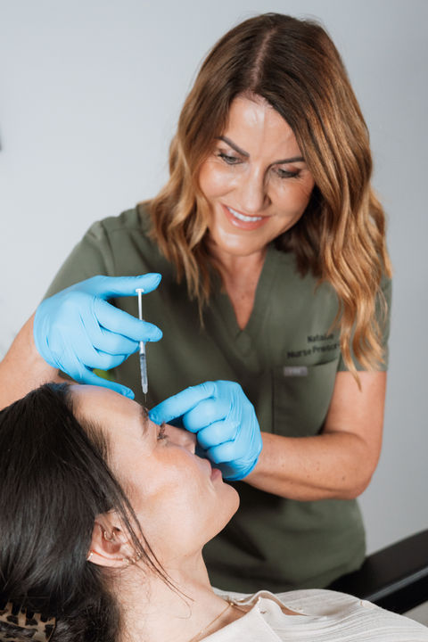 ND Enhance Aesthetics anti-wrinkle treatment on client