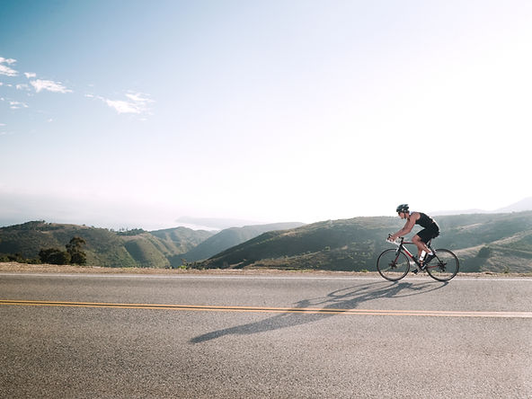 Cyclist on Mountain Road