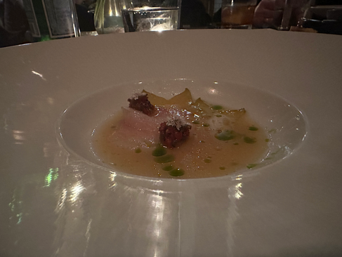 CRUDO from Ariete with baja kampachi, local star fruit, jimmy nardello redish photographed from Jabri Fine Dining JFD