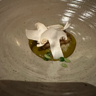 Delicate menu items from Chef's Table at Brooklyn Fare in New York. Two Michelin-star restaurant with elegant dining and beautiful atmosphere. Jabri Family Photograph.