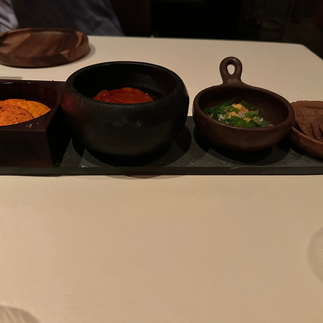 Four Appetizers in Cast Iron from the Bobby Flay experience in Chicago. Jabri Fine Dining experience and photographs