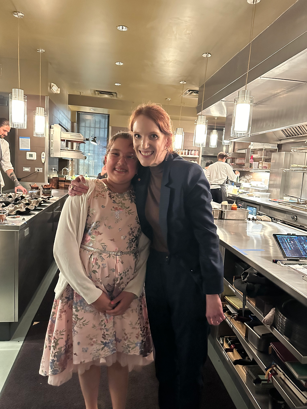 Emma and Ms. Hannah at Next. Michelin Star restaurant in Chicago during the Bobby Flay experience. Jabri Fine Dining photograph