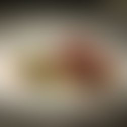 Japanese A5 Wagyu with greens and sauce and topped with flavorful garnish