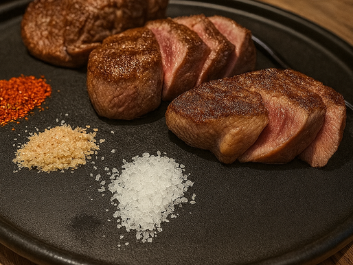 Flight of Wagyu from Capa in Orlando, FL. MIchelin- Star restaurant. black plate with different seasons with steak in dim lighting. Photo from Jabri Fine Dining photographer Emma Jabri