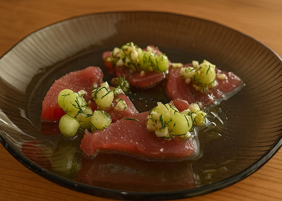 Thon Cru from Oak and Reel French Month August. Yellowfin Tuna, melon, fennel, dill. Photographed by Jabri Fine Dining.