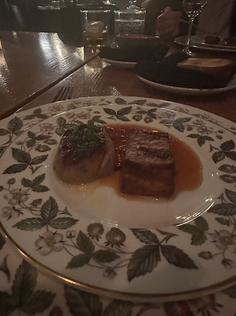 VENISON on decorative plate from Ariete in Miami. Truffle twice-baked potatoes, foie gras sauce Diane, and wild mushrooms