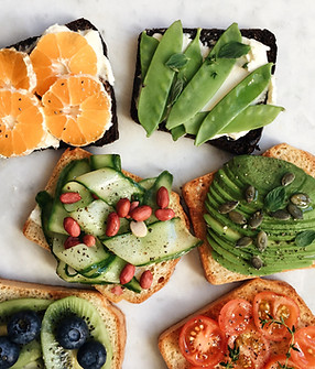 Colorful fruit and veggie toasts