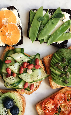 Colorful fruit and veggie toasts