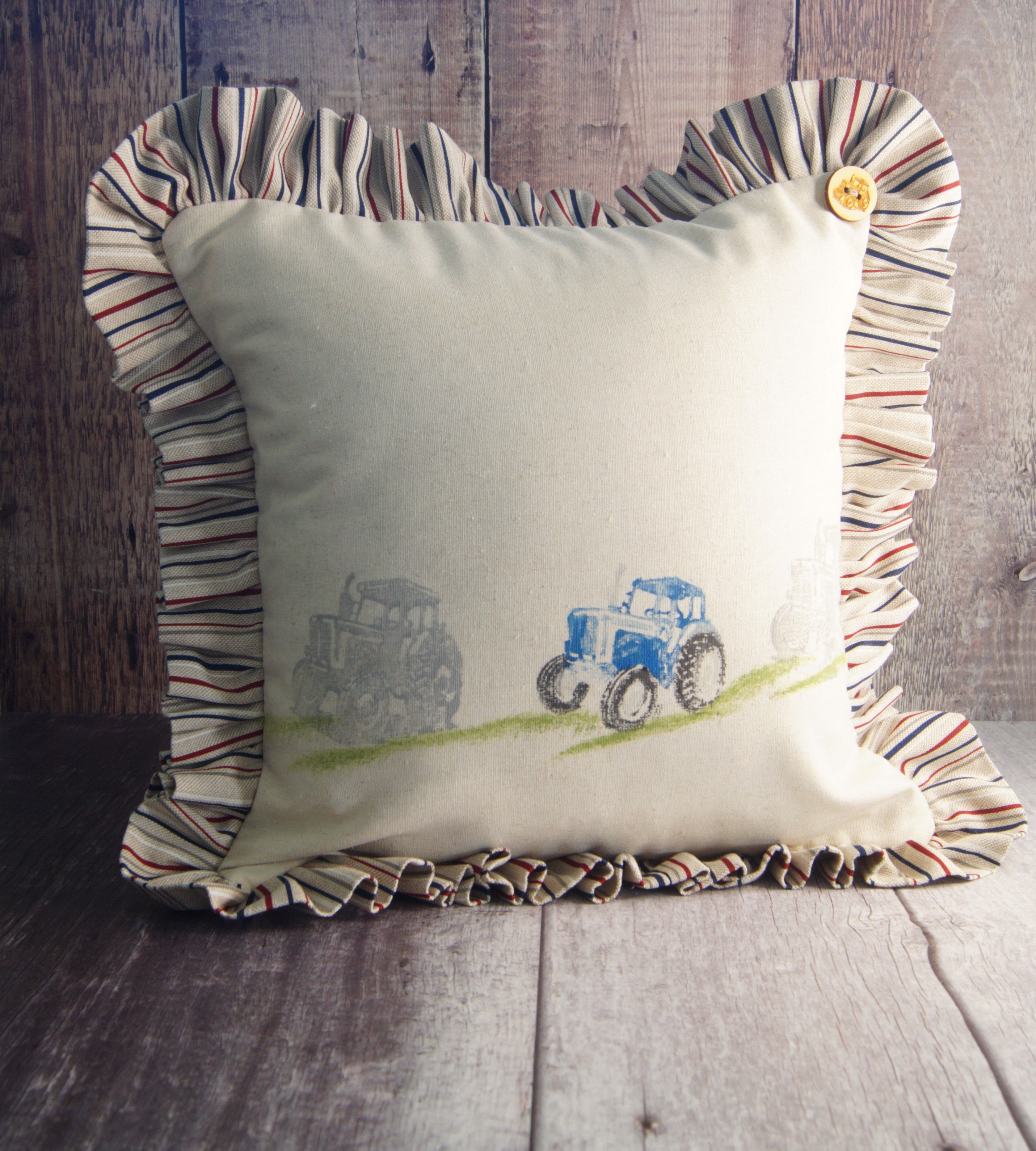 Blue and gray tractor on grass Hand block print cushion