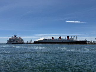 Queen Mary along side Carnival ship