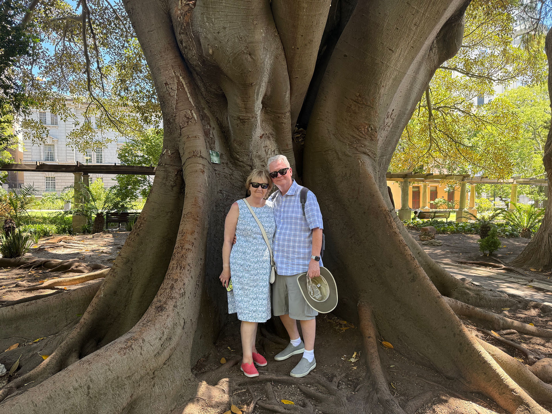 Posing with a rubber tree in VOC garden