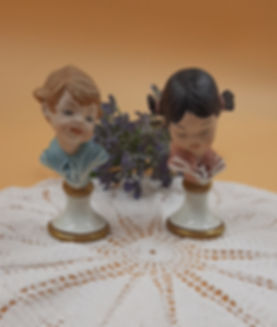 Coppia di piccoli busti in porcellana Capodimonte