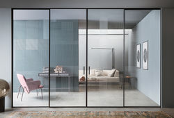 "Eleganza e Funzionalità: Vetrate Scorrevoli in Vetro Alluminio Lualdi"