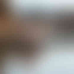 Reflection of a pregnant woman in the Columbia River during a Maternity Photoshoot in Fairmont Hot Springs