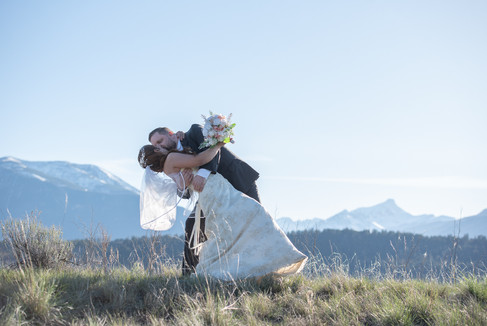 Dip and Kiss in front of Mountain Scenery at Eagle Ranch Resort, Invermere BC