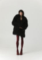 Full-length front view of Kamianske Black Eco-Coat by WeHeat - black eco-fur winter coat with a straight silhouette