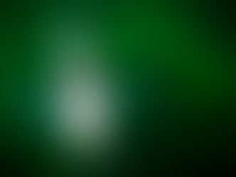 A bluegill on a green background.