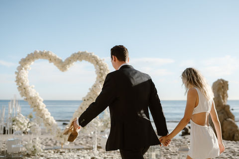 Proposal, Propose, Love, Marry Me, Engagement, Engaged, Decor, Event, Marriage, Ring, California, Malibu, Heart Arch, White, Roses, Taper Candles, Candles, Boxes, Aisle, Shore, Water, Ocean