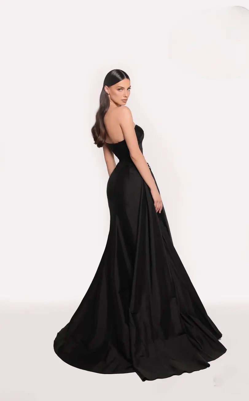 satin gown with ruched bodice, crystal-embellished waist, and draped detailing.