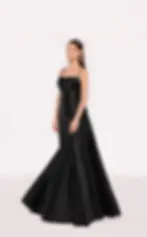 Black satin mermaid gown with ruched bodice, spaghetti straps, and elegant train.