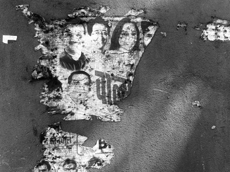 abstract street photography of torn posters from Hindi films