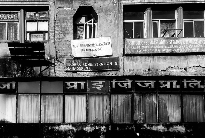 shop front with sign reading institute of business administration