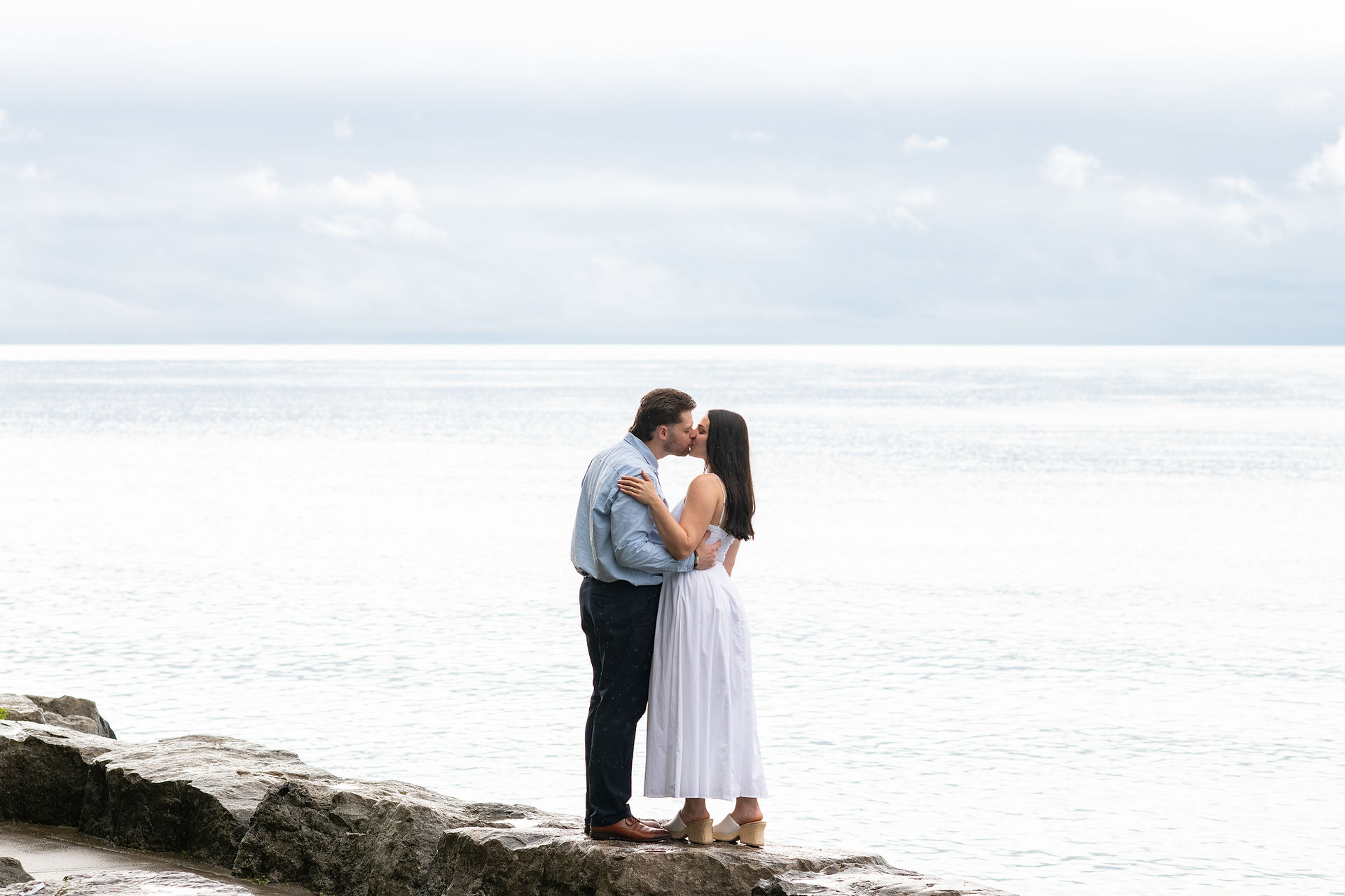 Romantic engagement portrait with lake views in Niagara-on-the-Lake.
