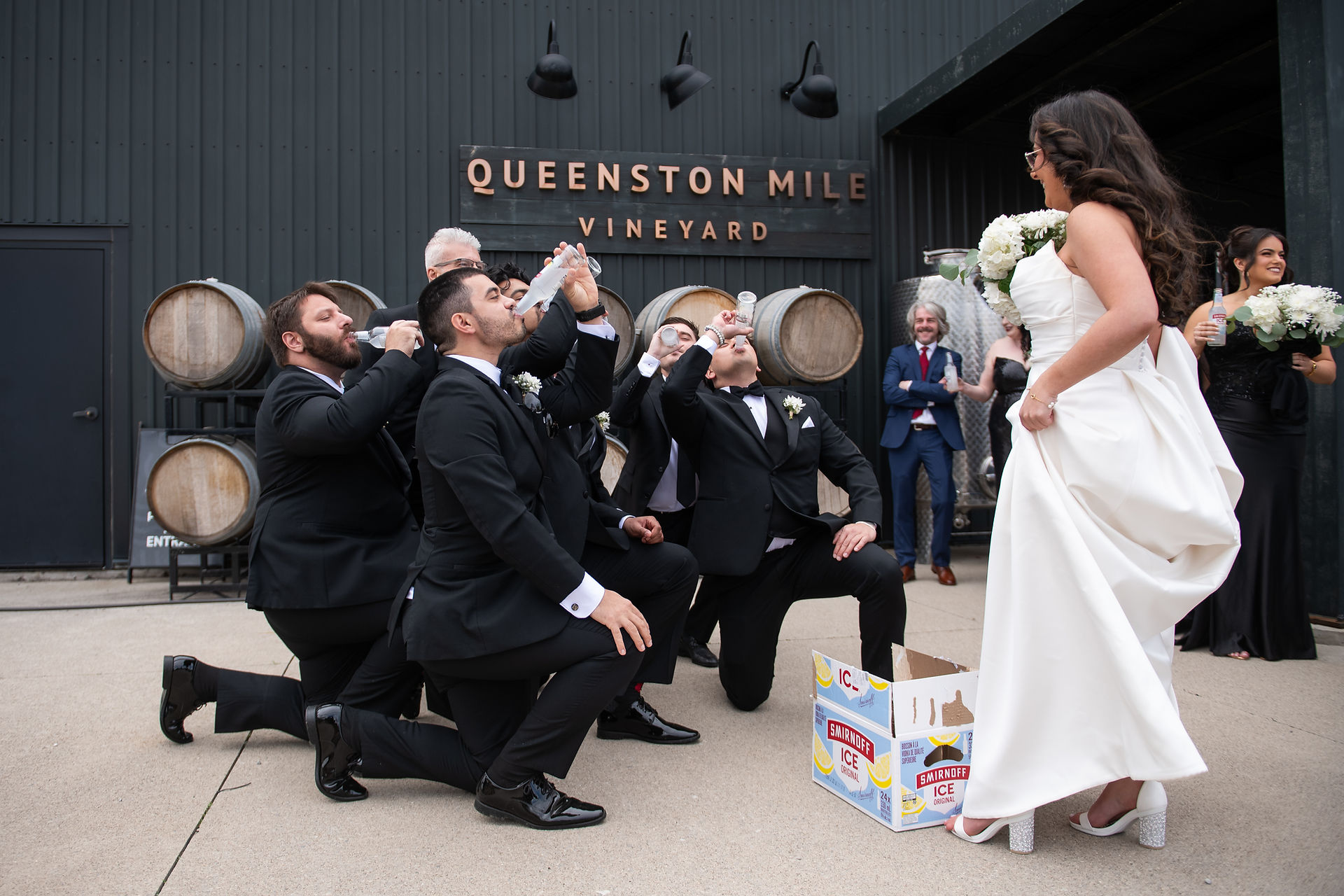 Candid wedding photography moments captured during a romantic Niagara vineyard wedding.