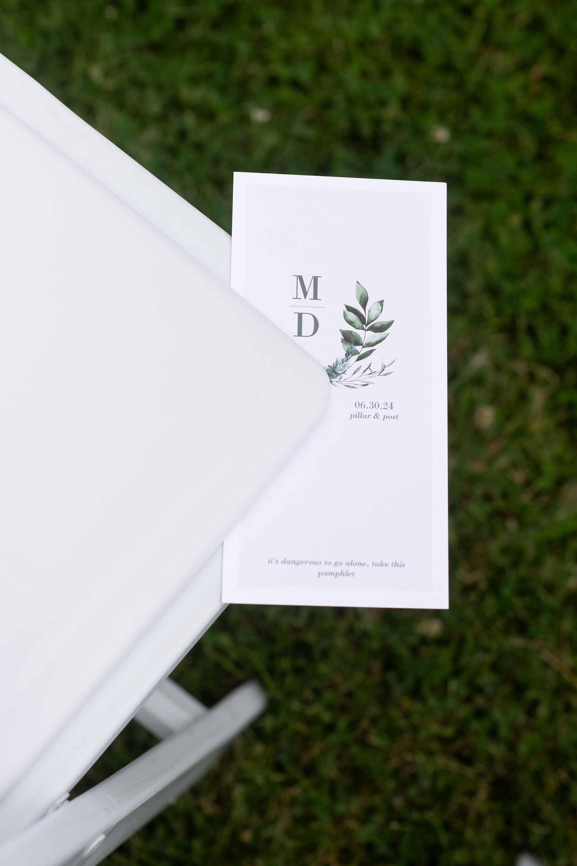 Niagara wedding photographer capturing rose garden ceremony at Pillar and Post in Niagara-on-the-Lake