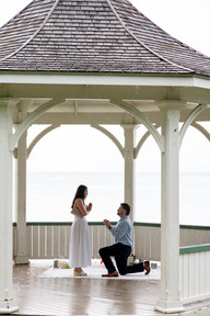 Surprise proposal in a lakeside gazebo on a rainy day in Niagara-on-the-Lake.