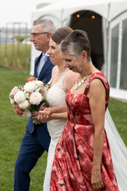 Vineyard wedding ceremony in Niagara-on-the-Lake photographed by Niagara wedding photographer