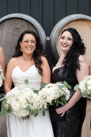 Candid wedding photography moments captured during a romantic Niagara vineyard wedding.