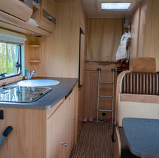 camper-van-rv-caravan-interior-motorhome-for-family-holiday-travel.jpg