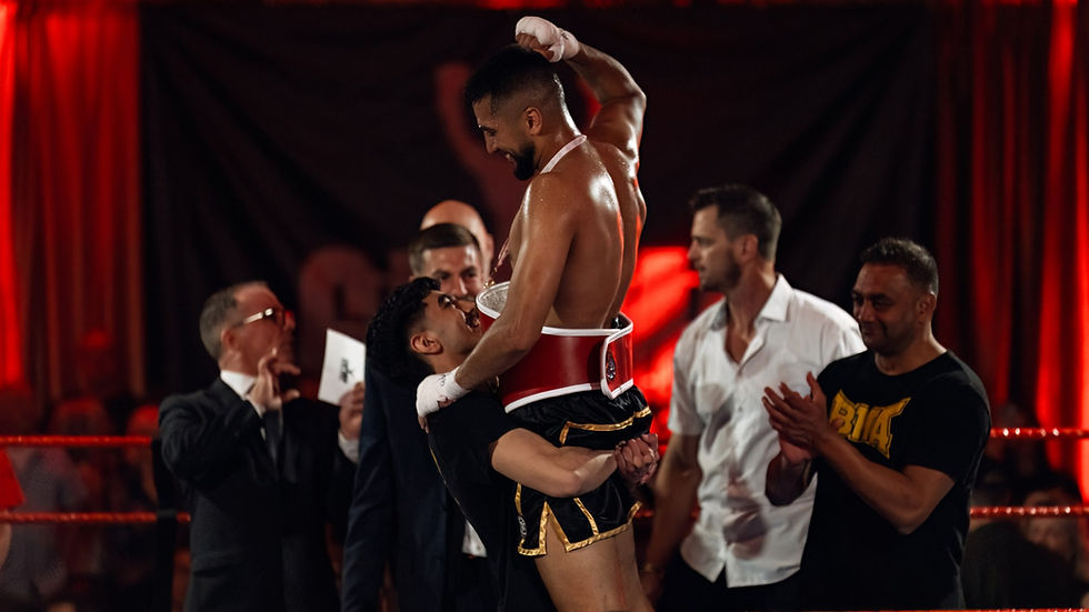 Boxer celebrating a win during a Live Stream Sports match.